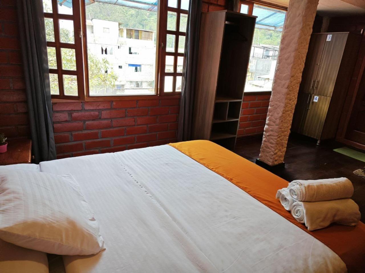 Garden House Hostal บาญอส ภายนอก รูปภาพ