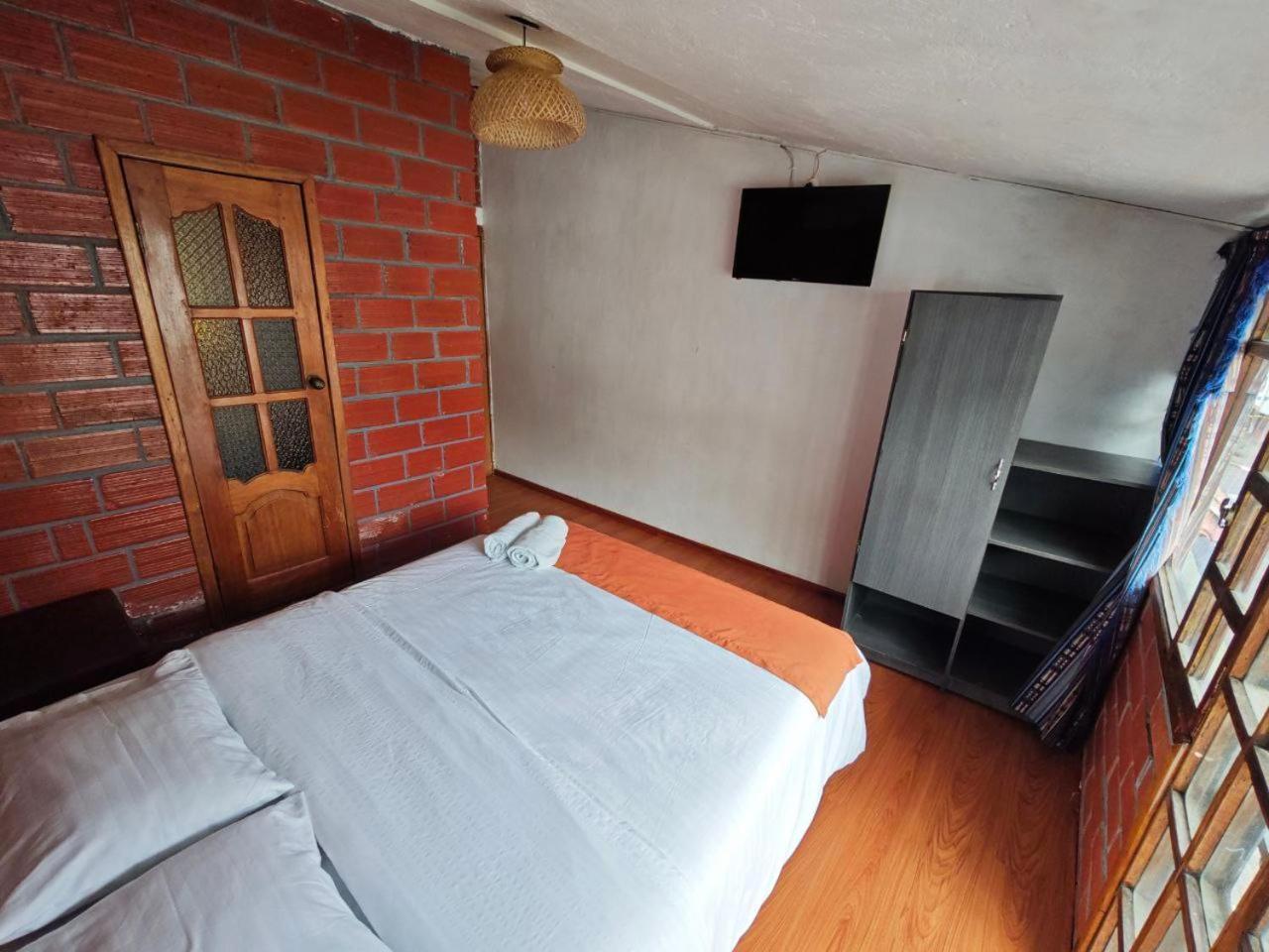 Garden House Hostal บาญอส ภายนอก รูปภาพ
