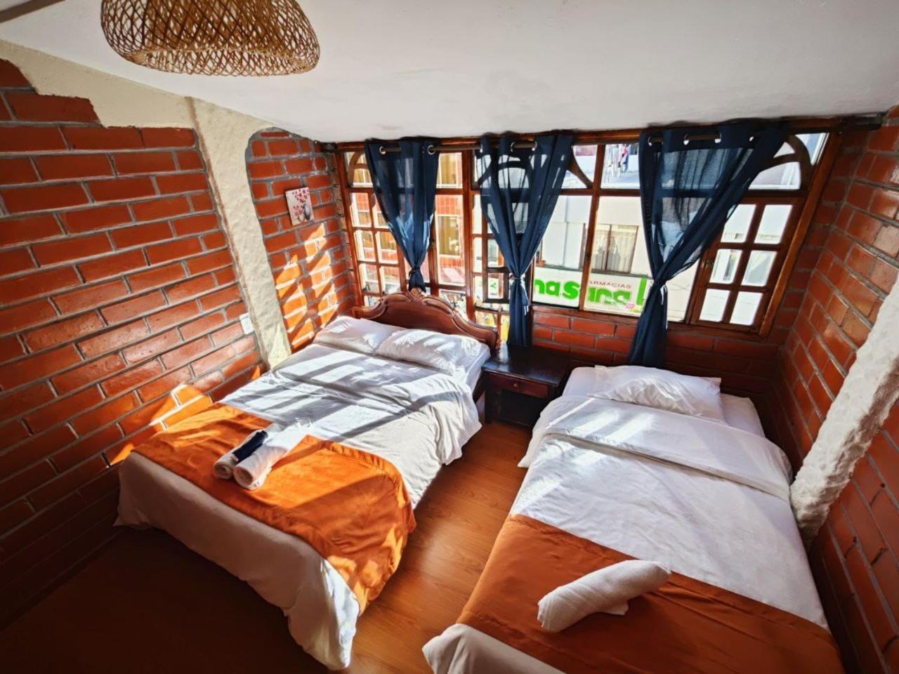 Garden House Hostal บาญอส ภายนอก รูปภาพ