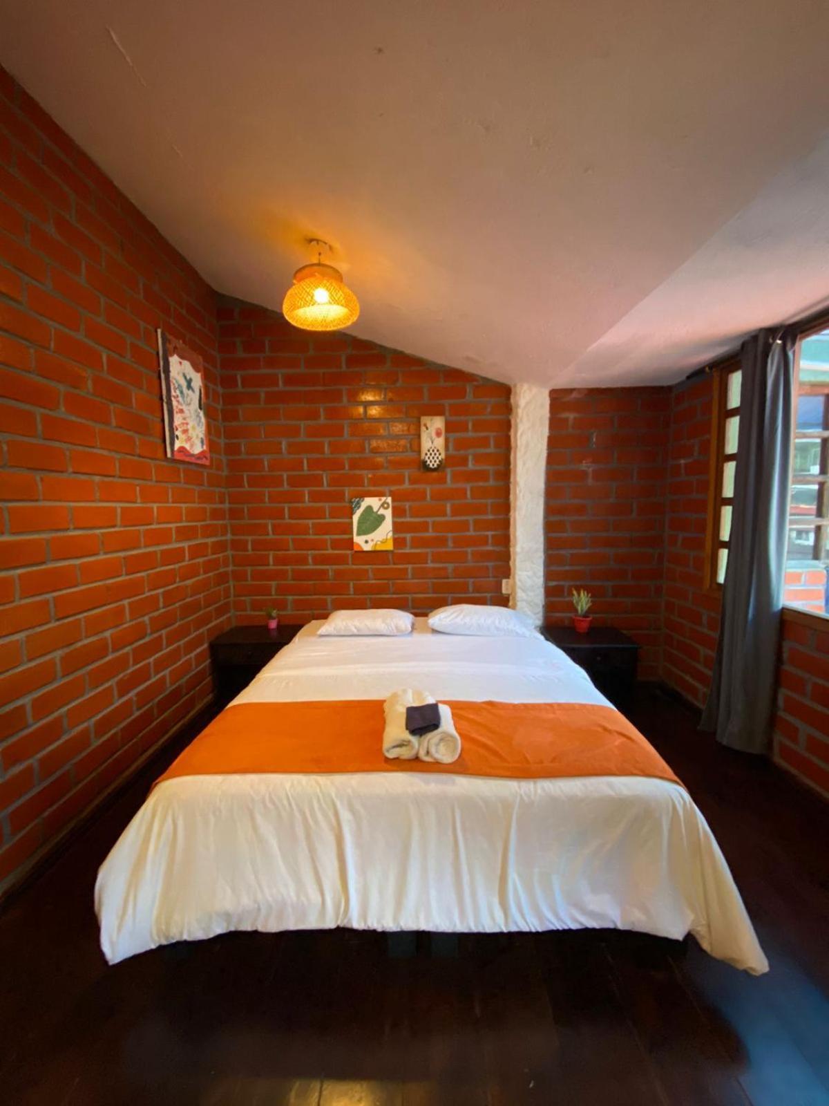 Garden House Hostal บาญอส ภายนอก รูปภาพ