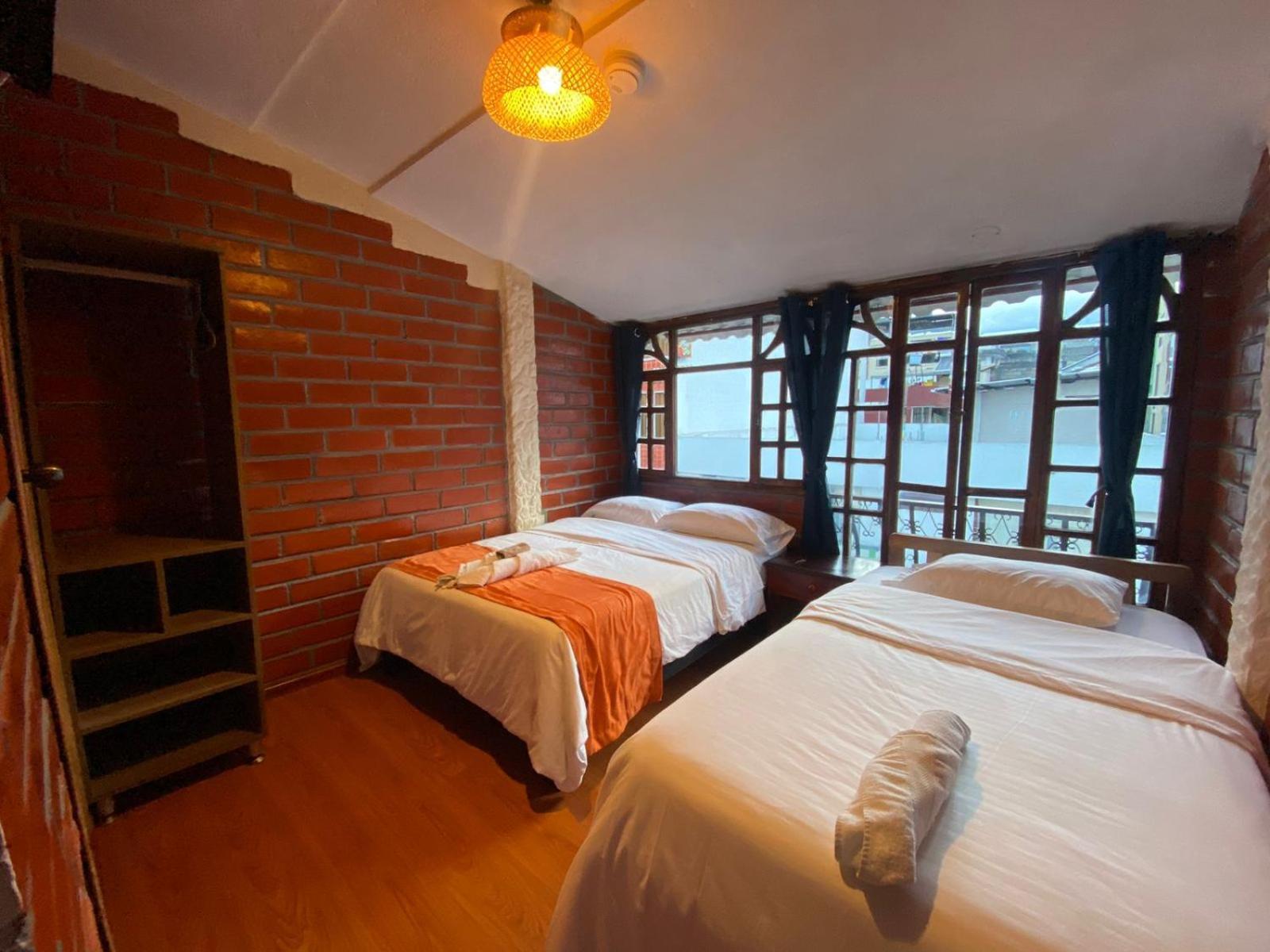 Garden House Hostal บาญอส ภายนอก รูปภาพ