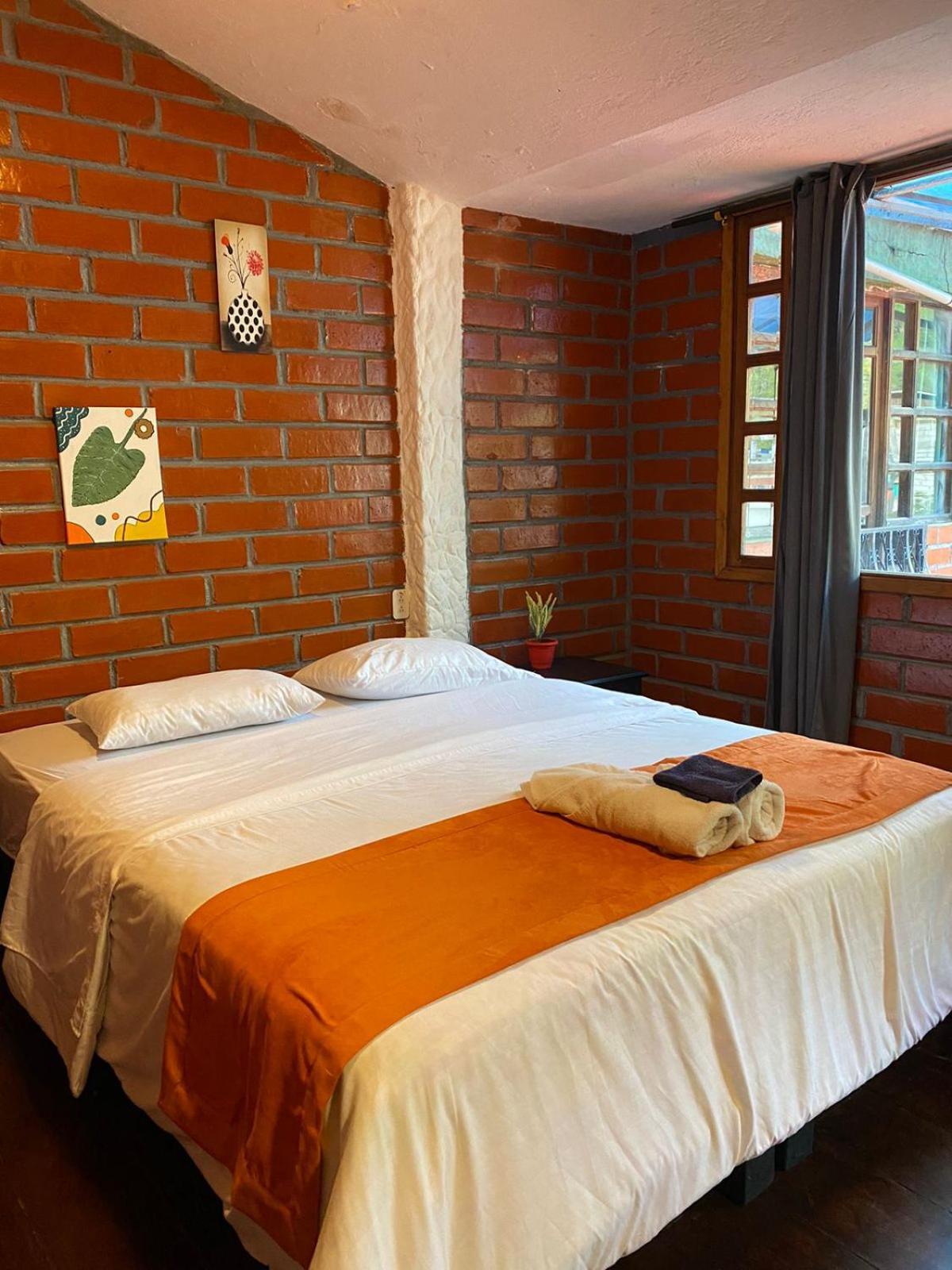 Garden House Hostal บาญอส ภายนอก รูปภาพ