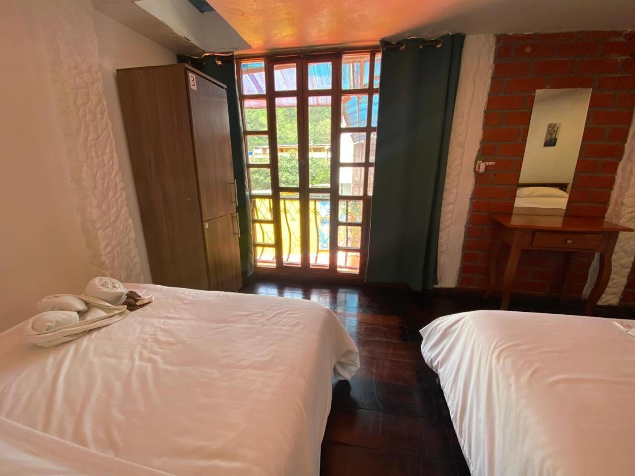 Garden House Hostal บาญอส ภายนอก รูปภาพ