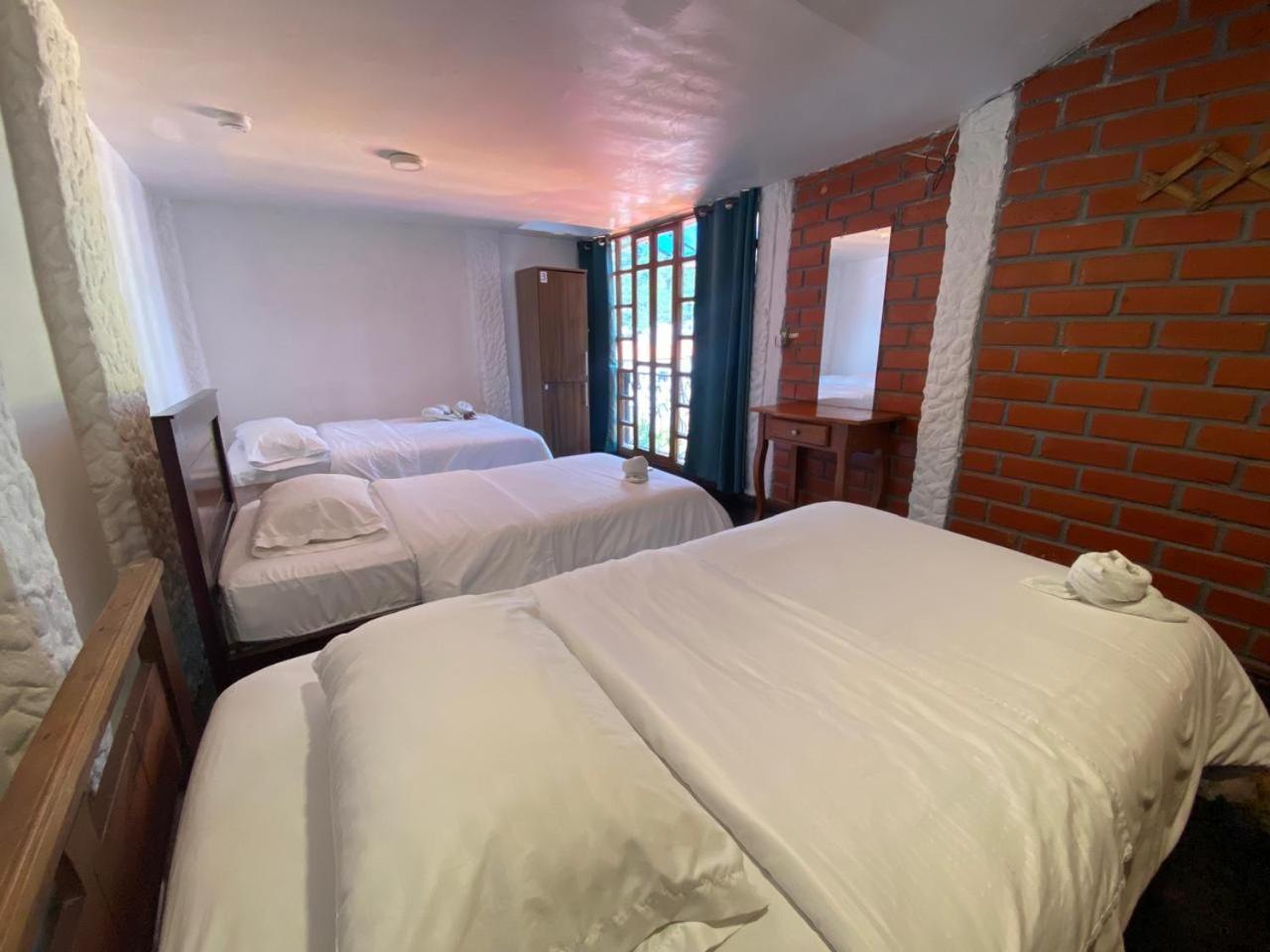 Garden House Hostal บาญอส ภายนอก รูปภาพ
