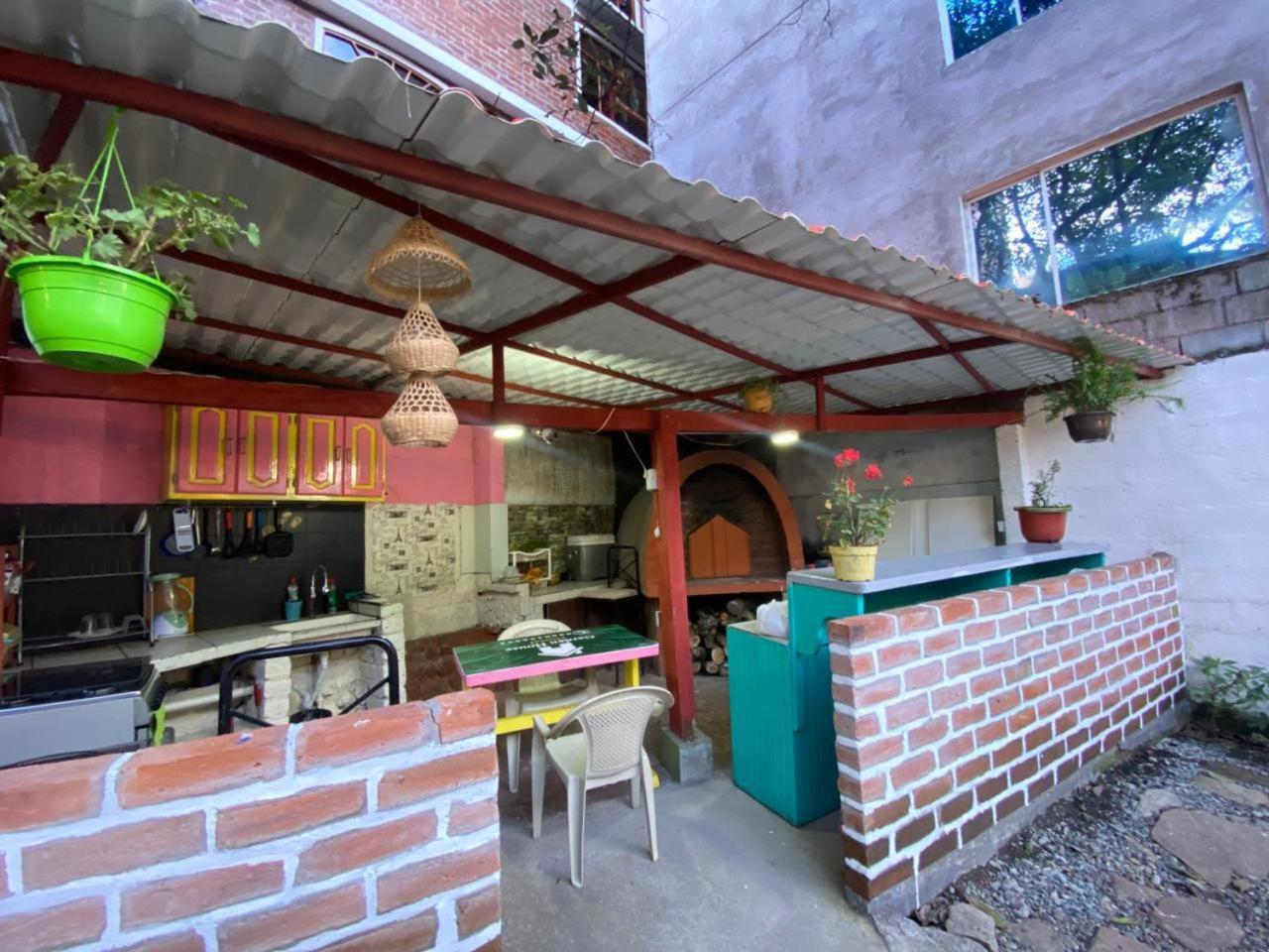 Garden House Hostal บาญอส ภายนอก รูปภาพ