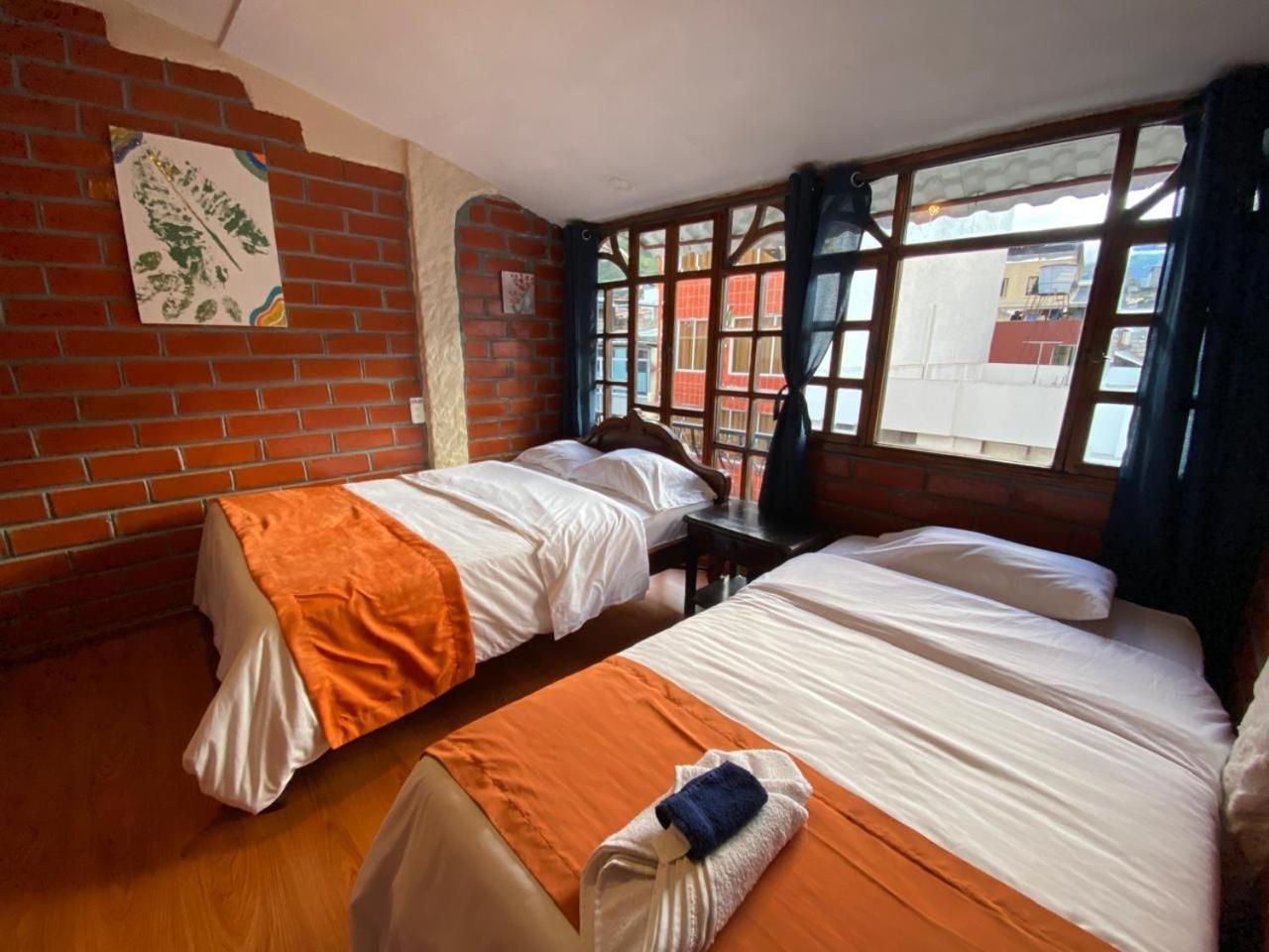Garden House Hostal บาญอส ภายนอก รูปภาพ