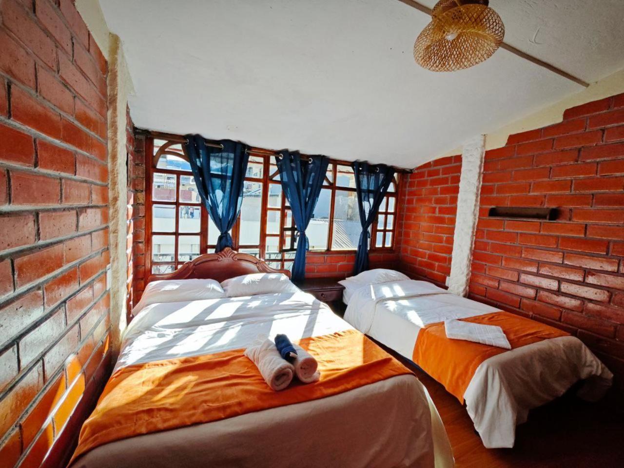 Garden House Hostal บาญอส ภายนอก รูปภาพ