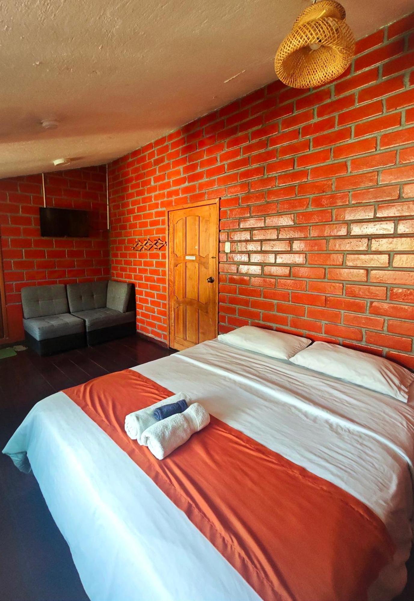Garden House Hostal บาญอส ภายนอก รูปภาพ